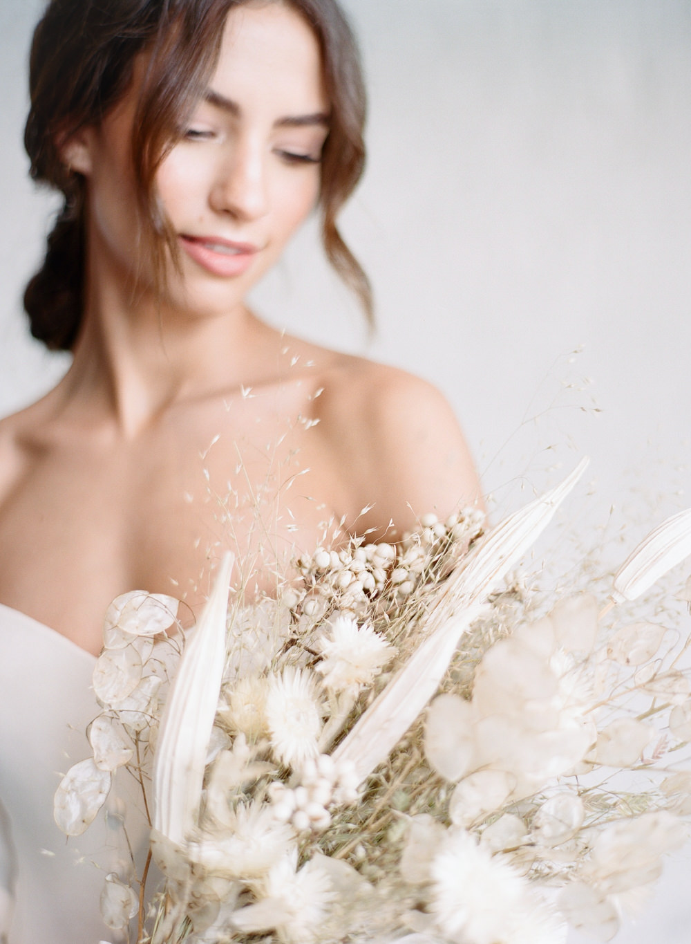 Bride with dried floral bouquet