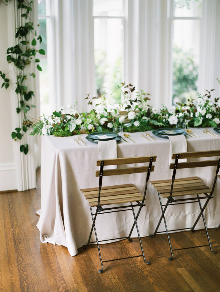 Modern botanical tablescabe with floral table runner