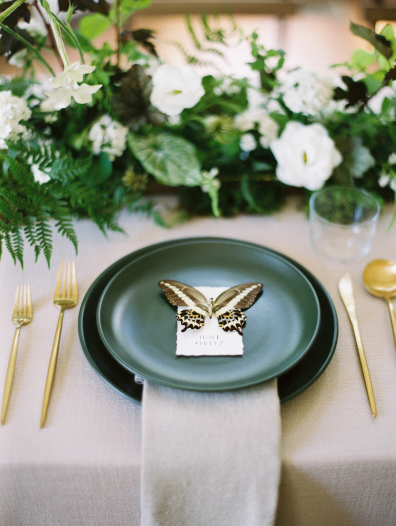 Botanical tablescape with butterfly escort card